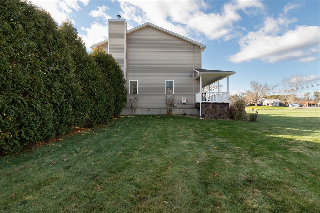 83 Bay Road Hadley, MA 01035 - Photo 27 of 36 a view of a house with backyard