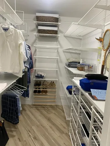 a kitchen with a stove and a refrigerator