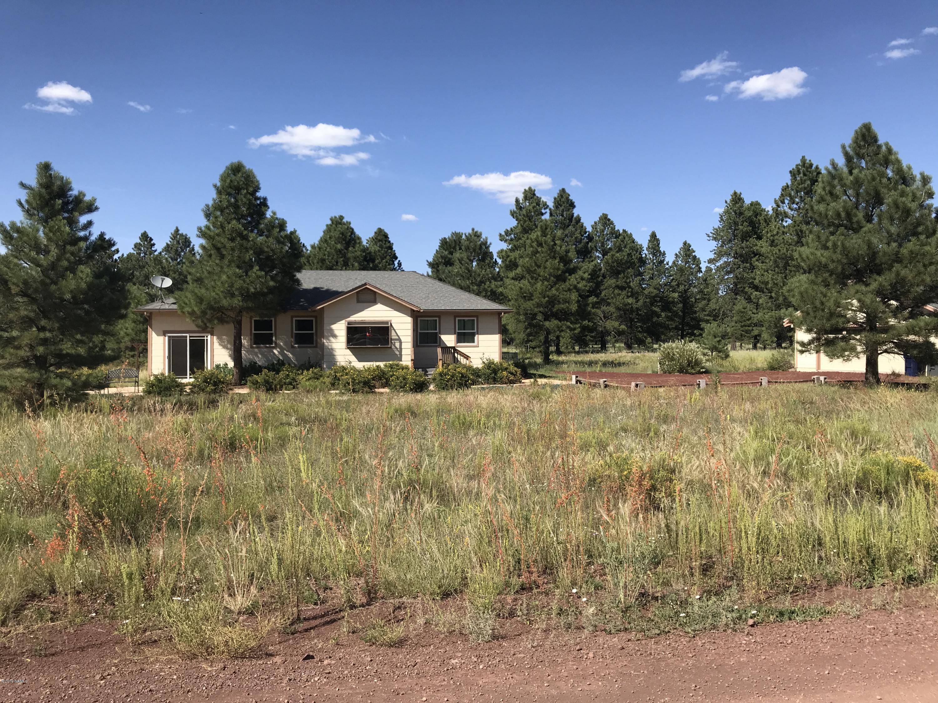 13295 King John Road Parks, AZ 86018 - Photo 1 of 18 Front View House & Garage