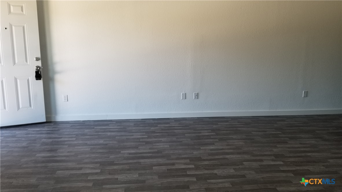 1063 Sleepy Hollow Lane Spring Branch, TX 78070 - Photo 7 of 14 a view of an empty room with wooden floor