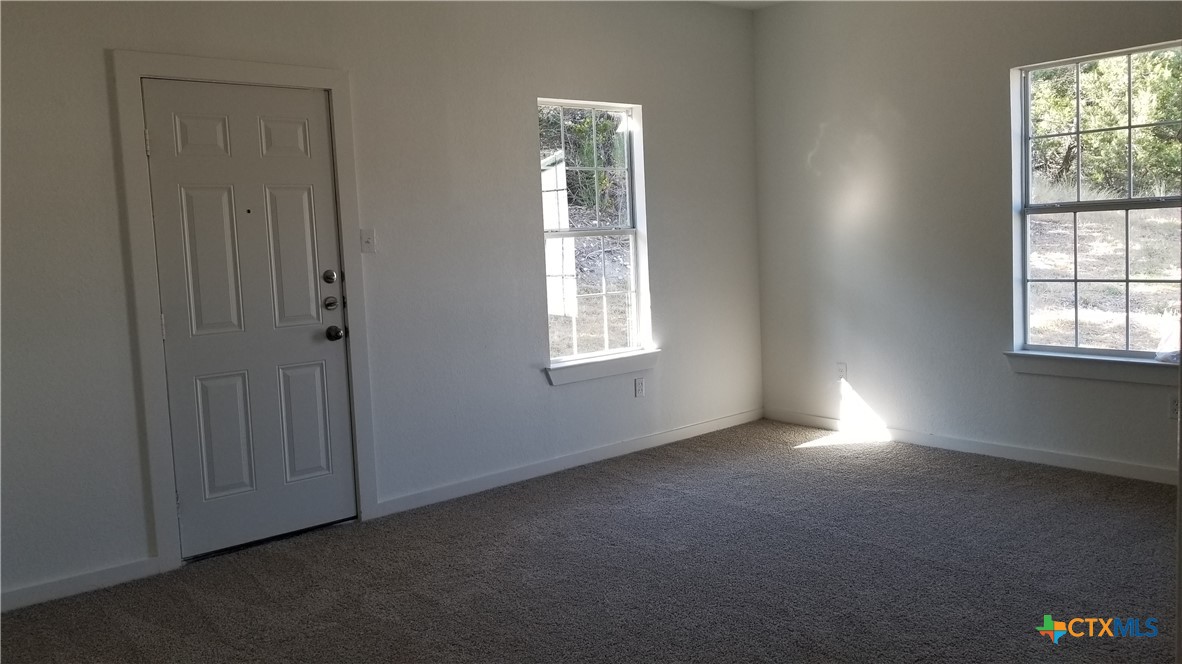 1063 Sleepy Hollow Lane Spring Branch, TX 78070 - Photo 8 of 14 an empty room with windows