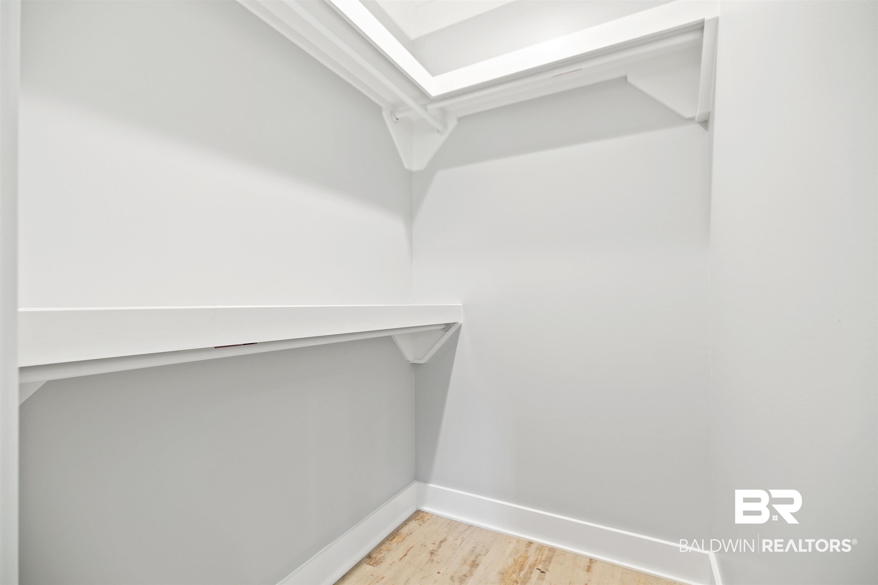 10507 County Road 1 Fairhope, AL 36532 - Photo 50 of 59 Spacious closet with light wood-type flooring