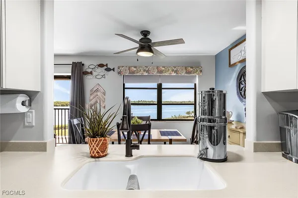 a view of a living room and entryway