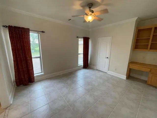a bathroom with a double vanity sink a toilet and a mirror
