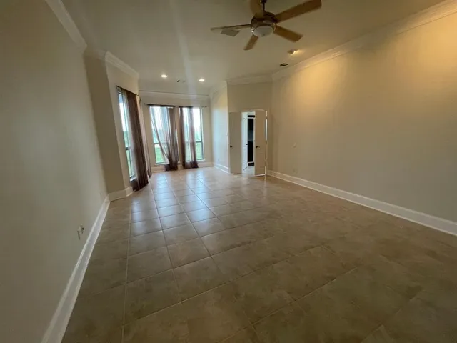 a bathroom with a glass door shower and a sink