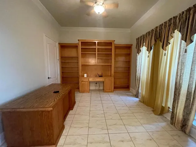a view of walk in closet with window