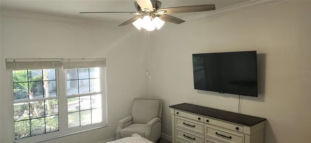 a bedroom with a bed and a mirror