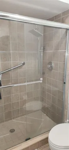 a backyard of a house with outdoor seating