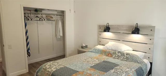 a view of a backyard with swimming pool