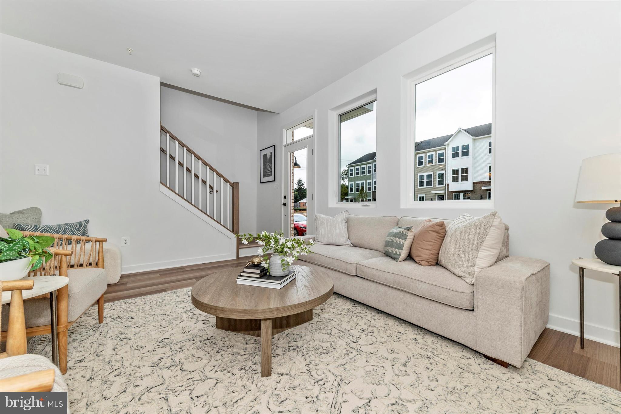 720 Iron Frg Road Frederick, MD 21702 - Photo 5 of 33 a living room with furniture and a table