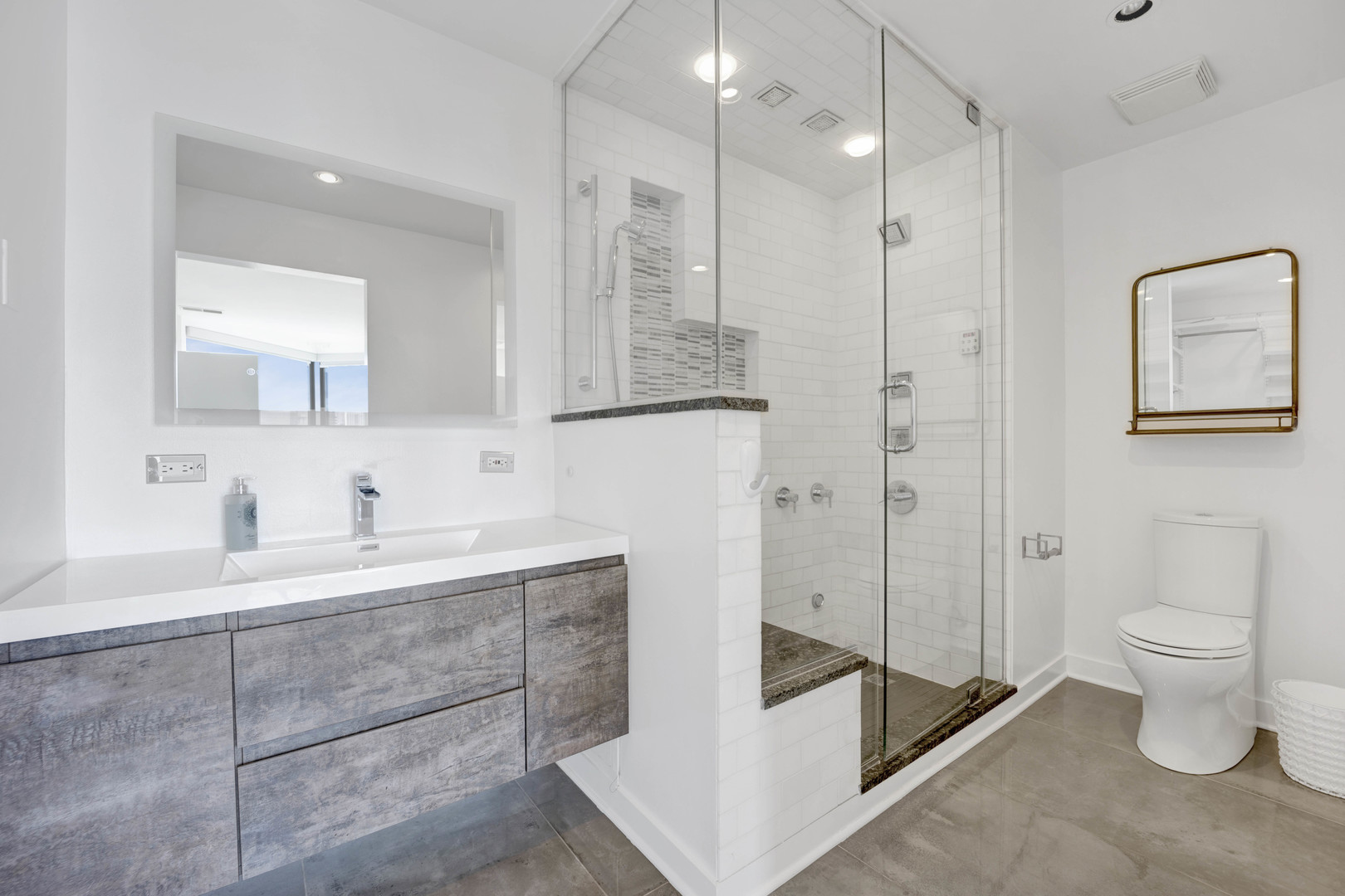 222 South Racine Avenue, Unit 606 Chicago, IL 60607 - Photo 13 of 20 a bathroom with a sink a toilet and a shower