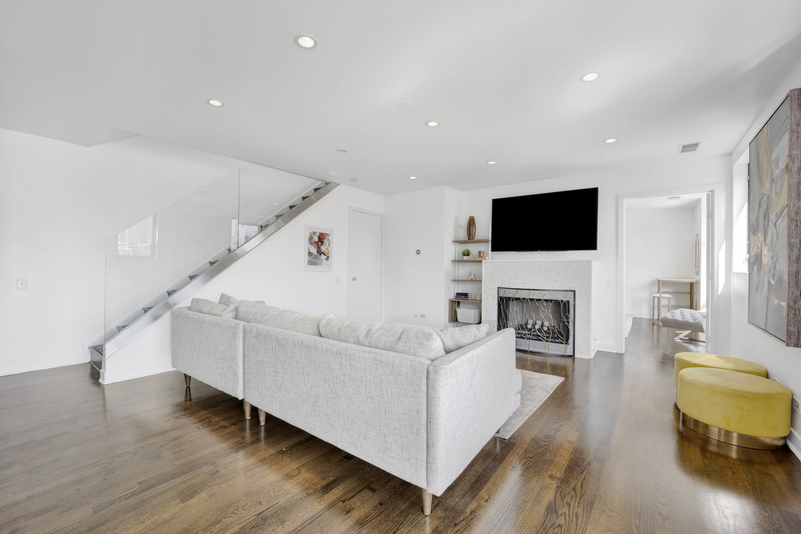 222 South Racine Avenue, Unit 606 Chicago, IL 60607 - Photo 4 of 20 a living room with furniture and a fireplace