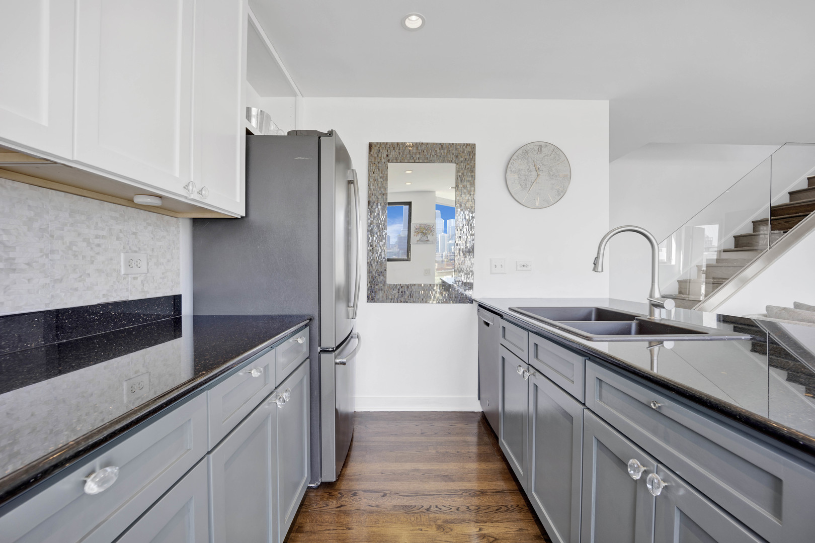 222 South Racine Avenue, Unit 606 Chicago, IL 60607 - Photo 9 of 20 a kitchen with granite countertop stainless steel appliances a sink and cabinets