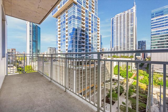 a view of balcony with city