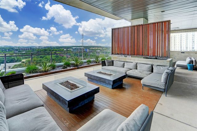 a view of a patio with couches and a table