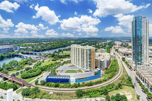 a view of city with tall buildings