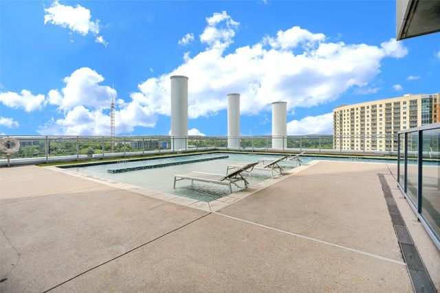 a view of balcony with furniture