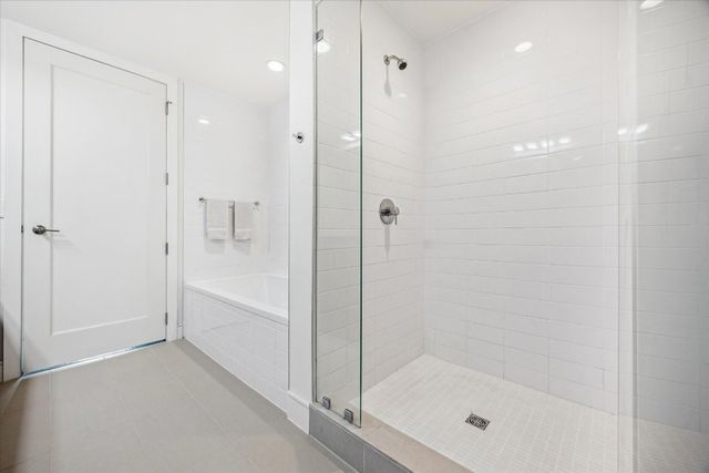 a bathroom with a sink double vanity and a mirror
