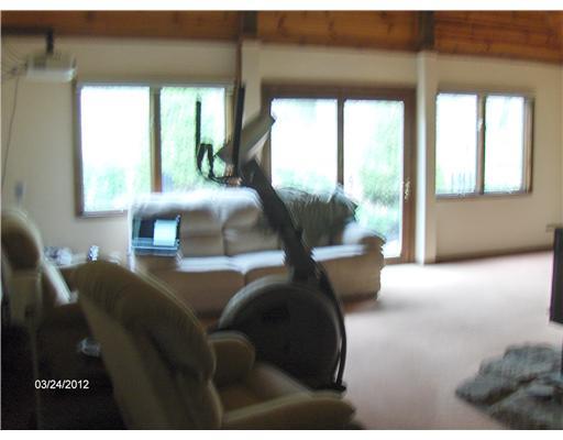 164 Glade Run Road Renfrew, PA 16053 - Photo 13 of 18 Living Room. fuzzy but showing windows one side of large room