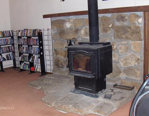 164 Glade Run Road Renfrew, PA 16053 - Photo 15 of 18 Family Room. Woodburner in family room across from large windows
