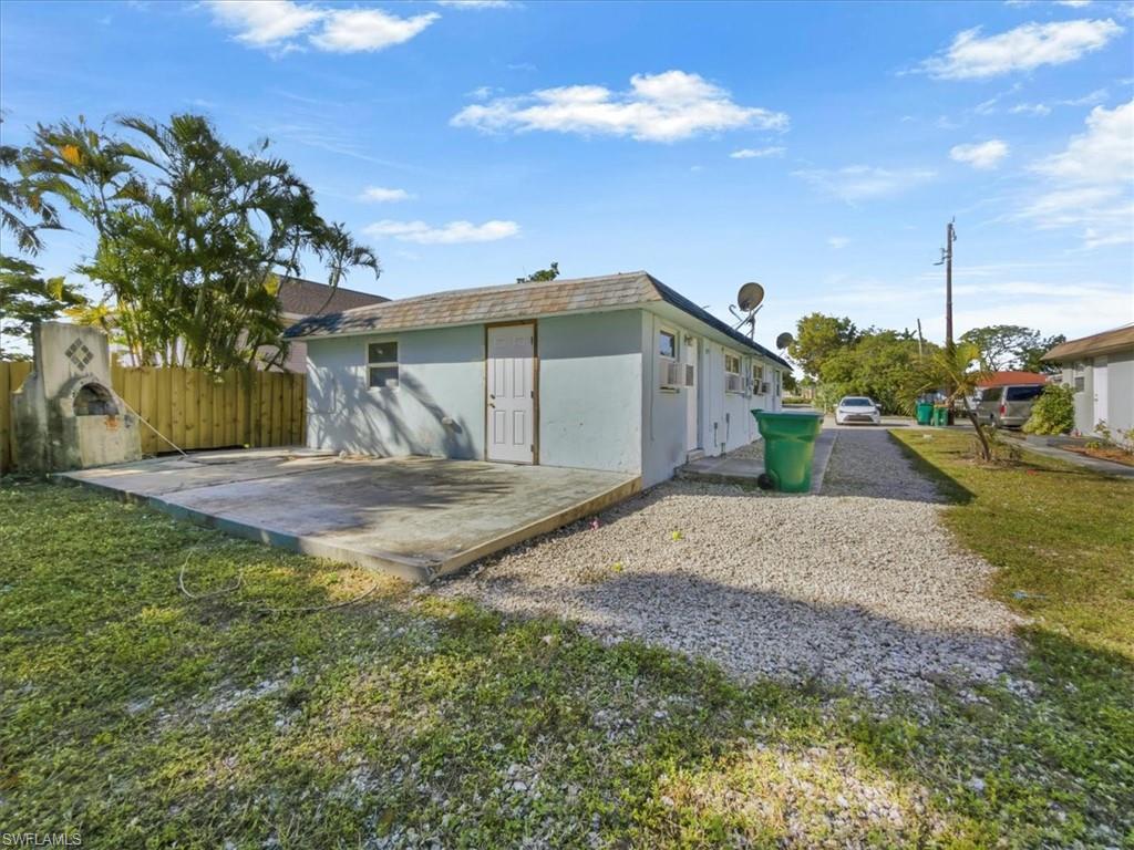 2495 Bayside Street Naples, FL 34112 - Photo 1 of 36 a view of outdoor space yard and patio