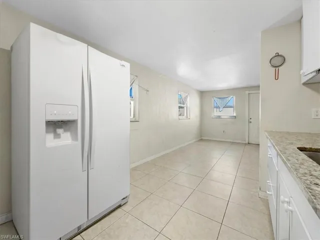 a view of a kitchen with a sink