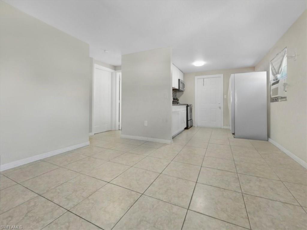 2495 Bayside Street Naples, FL 34112 - Photo 14 of 36 a view of an empty room