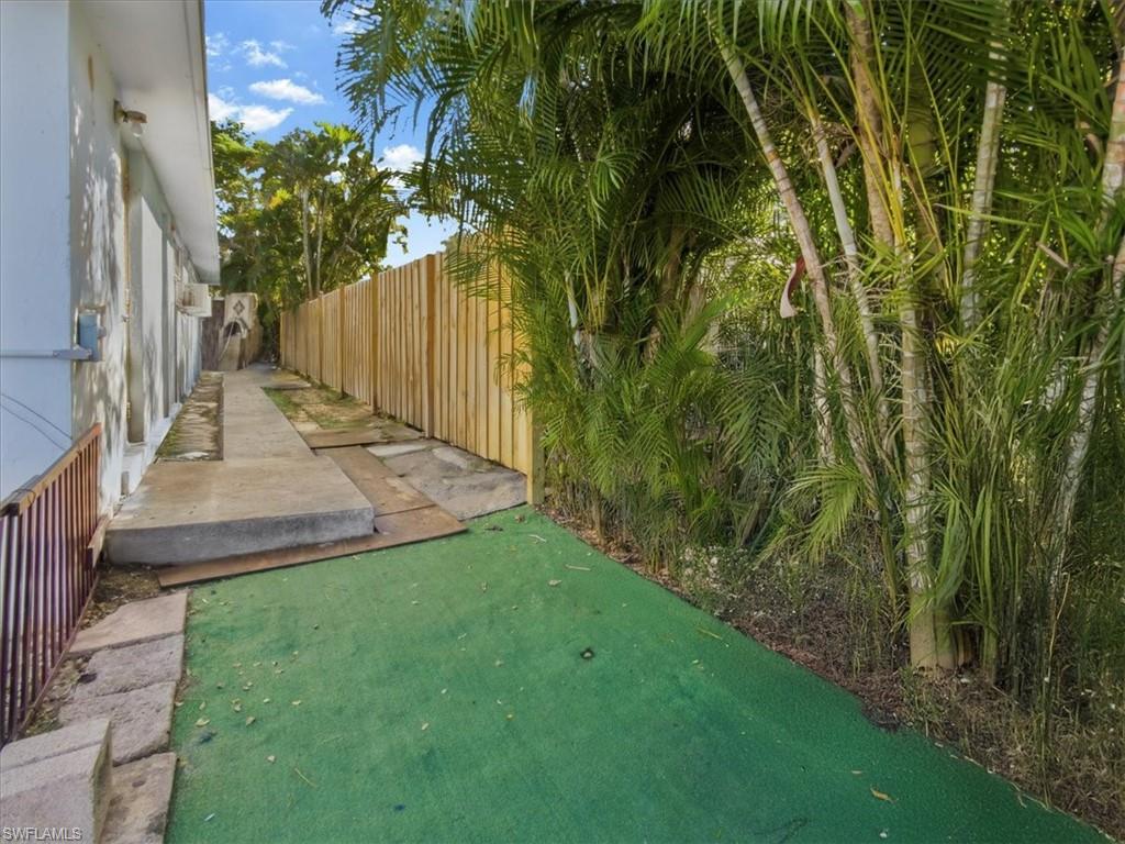 2495 Bayside Street Naples, FL 34112 - Photo 28 of 36 a view of yard with small space