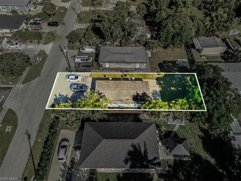 2495 Bayside Street Naples, FL 34112 - Photo 3 of 36 an aerial view of house with yard