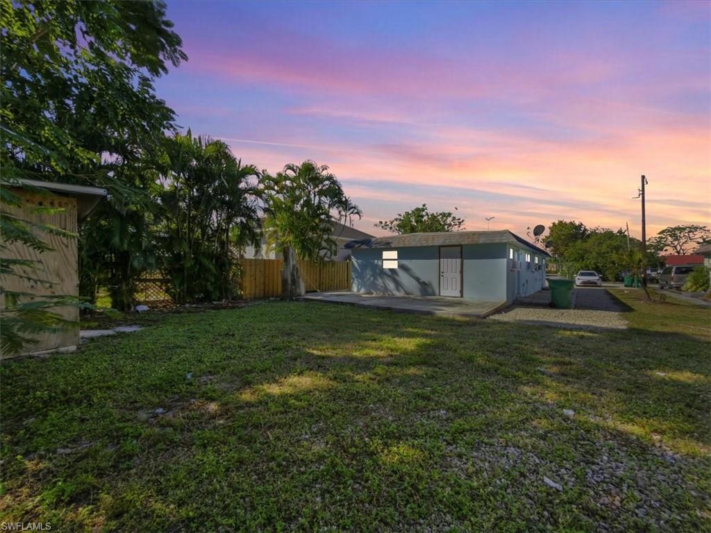 2495 Bayside Street Naples, FL 34112 - Photo 35 of 36 a fire hydrant in the middle of a field