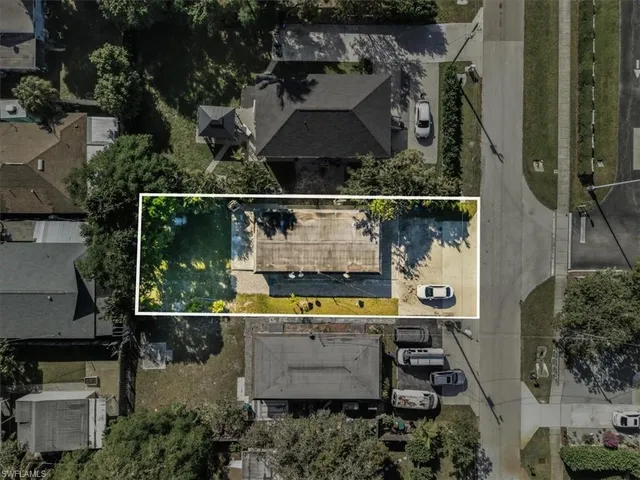 an aerial view of a house with a garden