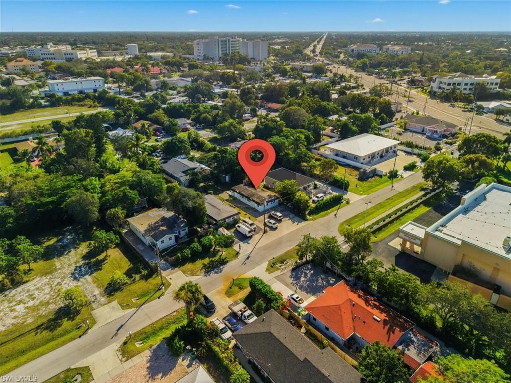2495 Bayside Street Naples, FL 34112 - Photo 8 of 36 an aerial view of residential houses with outdoor space