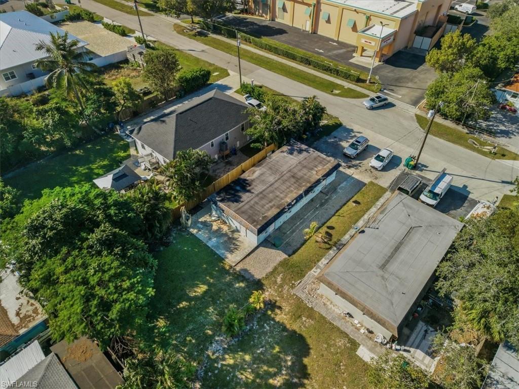 2495 Bayside Street Naples, FL 34112 - Photo 10 of 36 an aerial view of a house with a garden