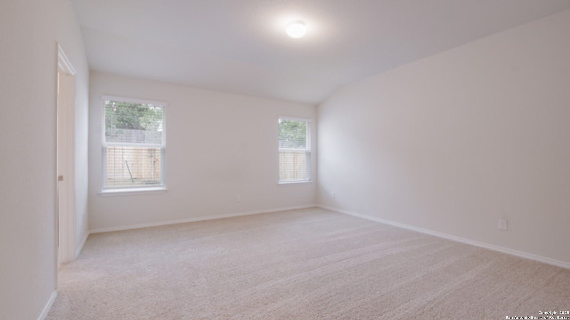 29631 Copper Crossing Bulverde, TX 78163 - Photo 12 of 16 a view of an empty room with a window