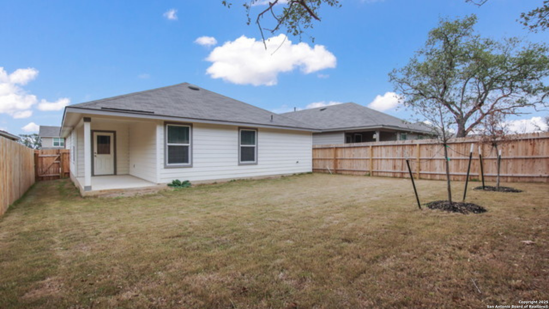 29631 Copper Crossing Bulverde, TX 78163 - Photo 16 of 16 a view of a house with a backyard