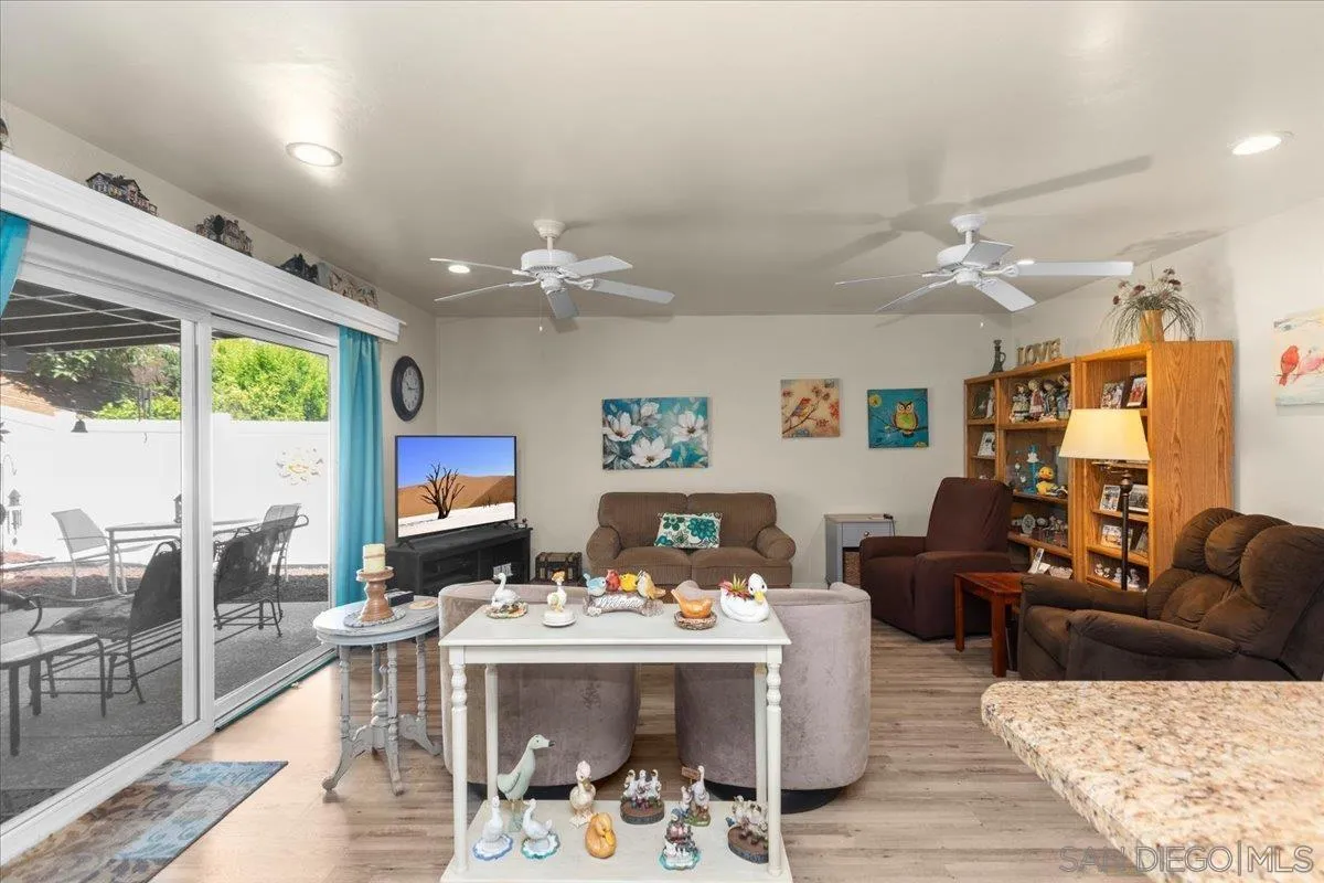 9254 Shadow Hill Road Santee, CA 92071 - Photo 7 of 34 a living room with furniture and a table