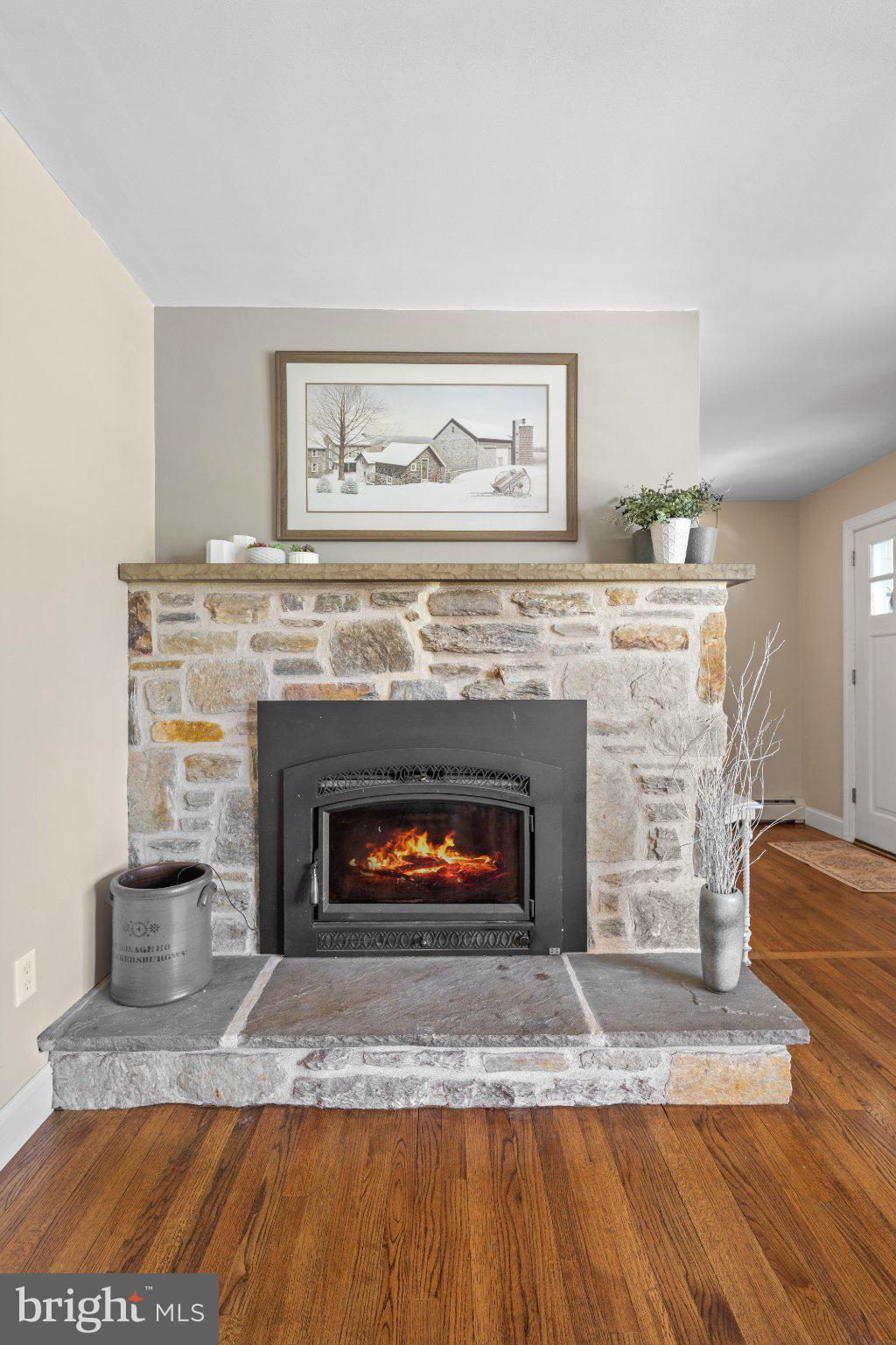 418 Church Road Hatfield, PA 19440 - Photo 20 of 53 Cozy stone fireplace with warm ambiance.