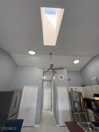 a view of a hallway with seating area