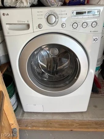 a utility room with washer and dryer