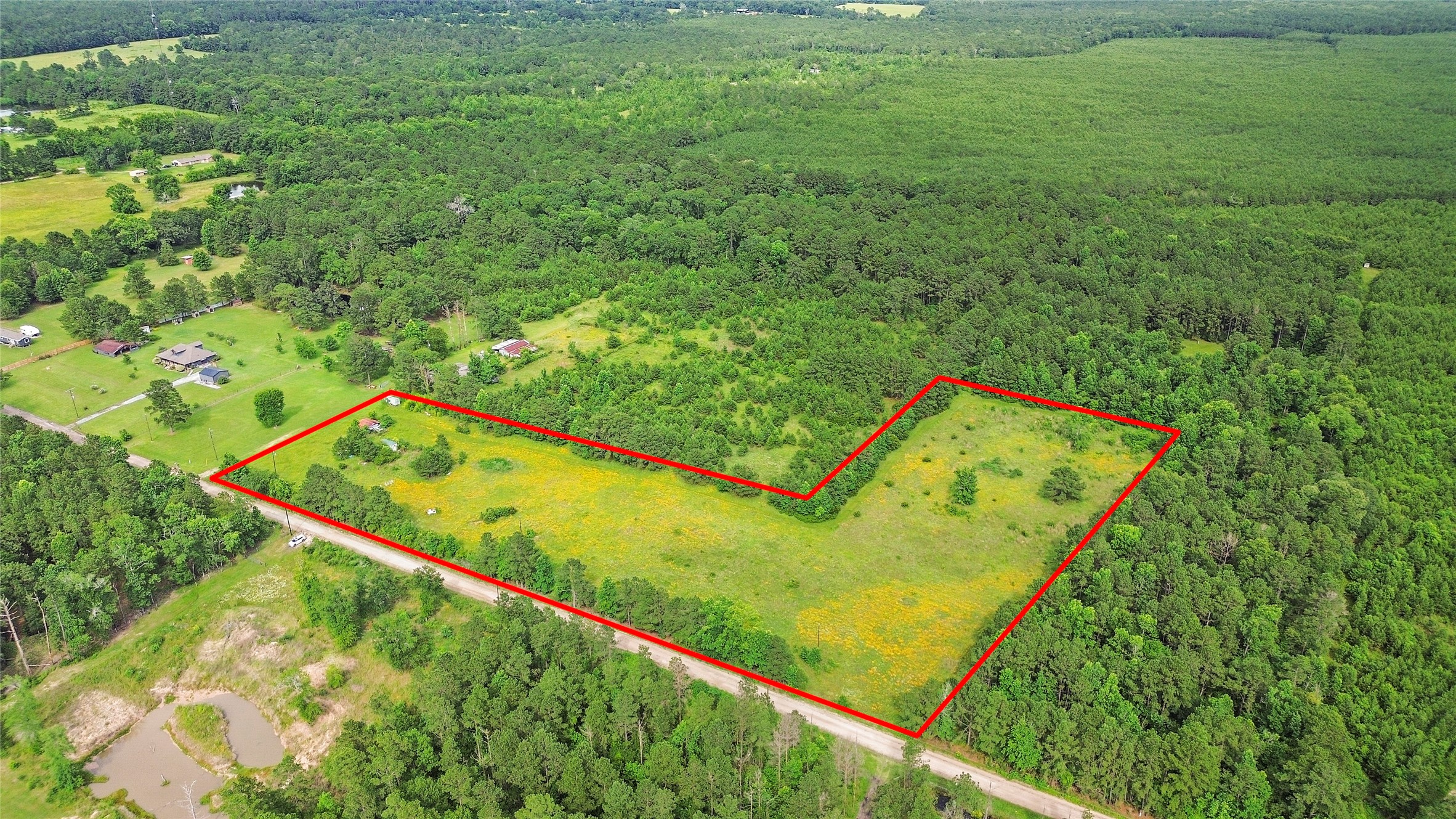 a view of a yard from a balcony