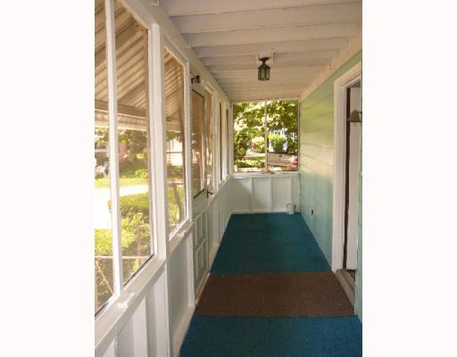 5 Andrew Comstock Road Warwick, RI 02886 - Photo 3 of 12 Other. Lovely screened-in porch provides breeze-filled views of the Bay.