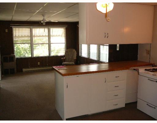 5 Andrew Comstock Road Warwick, RI 02886 - Photo 4 of 12 Kitchen. Open living area has bay views out every window.