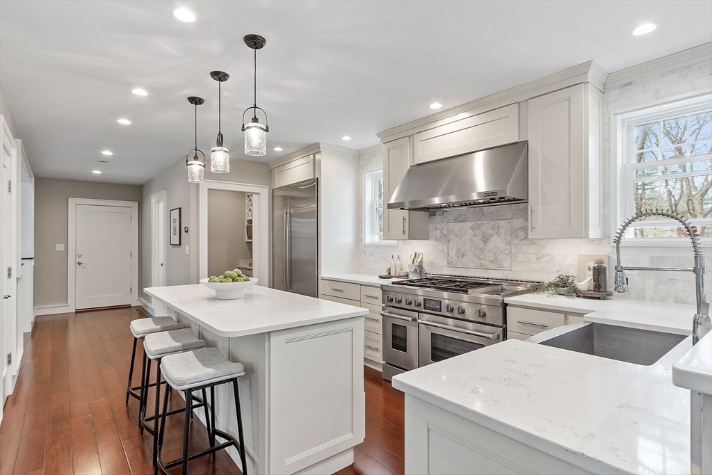 1 Pine Grove Road Medfield, MA 02052 - Photo 13 of 36 a kitchen that has a lot of cabinets in it wooden floors and a sink