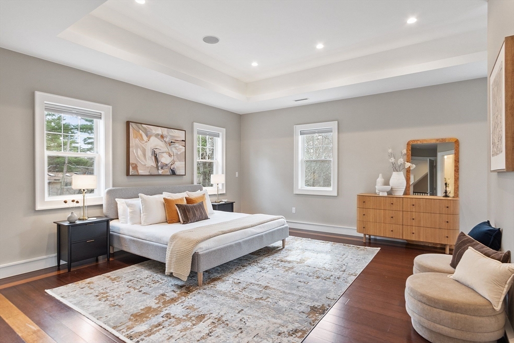 1 Pine Grove Road Medfield, MA 02052 - Photo 23 of 36 a bedroom with a large bed and a couch