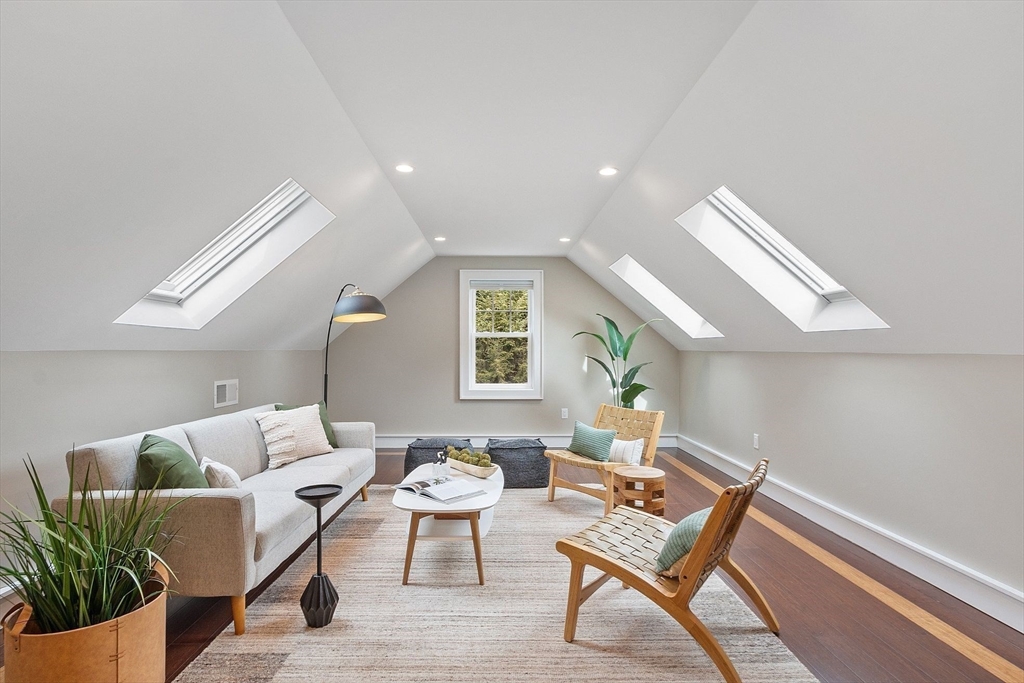 1 Pine Grove Road Medfield, MA 02052 - Photo 28 of 36 a living room with furniture and a wooden floor