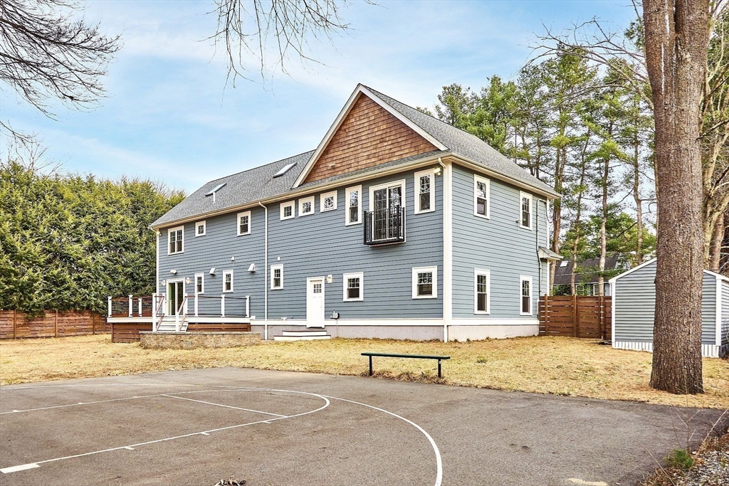 1 Pine Grove Road Medfield, MA 02052 - Photo 32 of 36 a house that has a tree in front of it