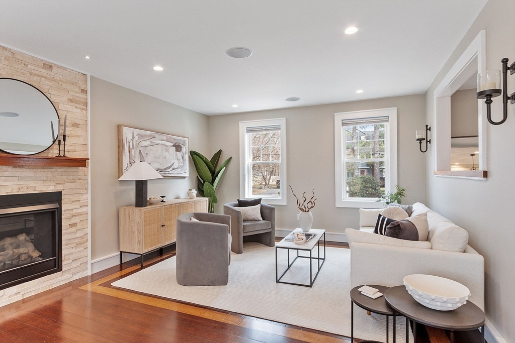1 Pine Grove Road Medfield, MA 02052 - Photo 7 of 36 a living room with furniture a large window and a fireplace