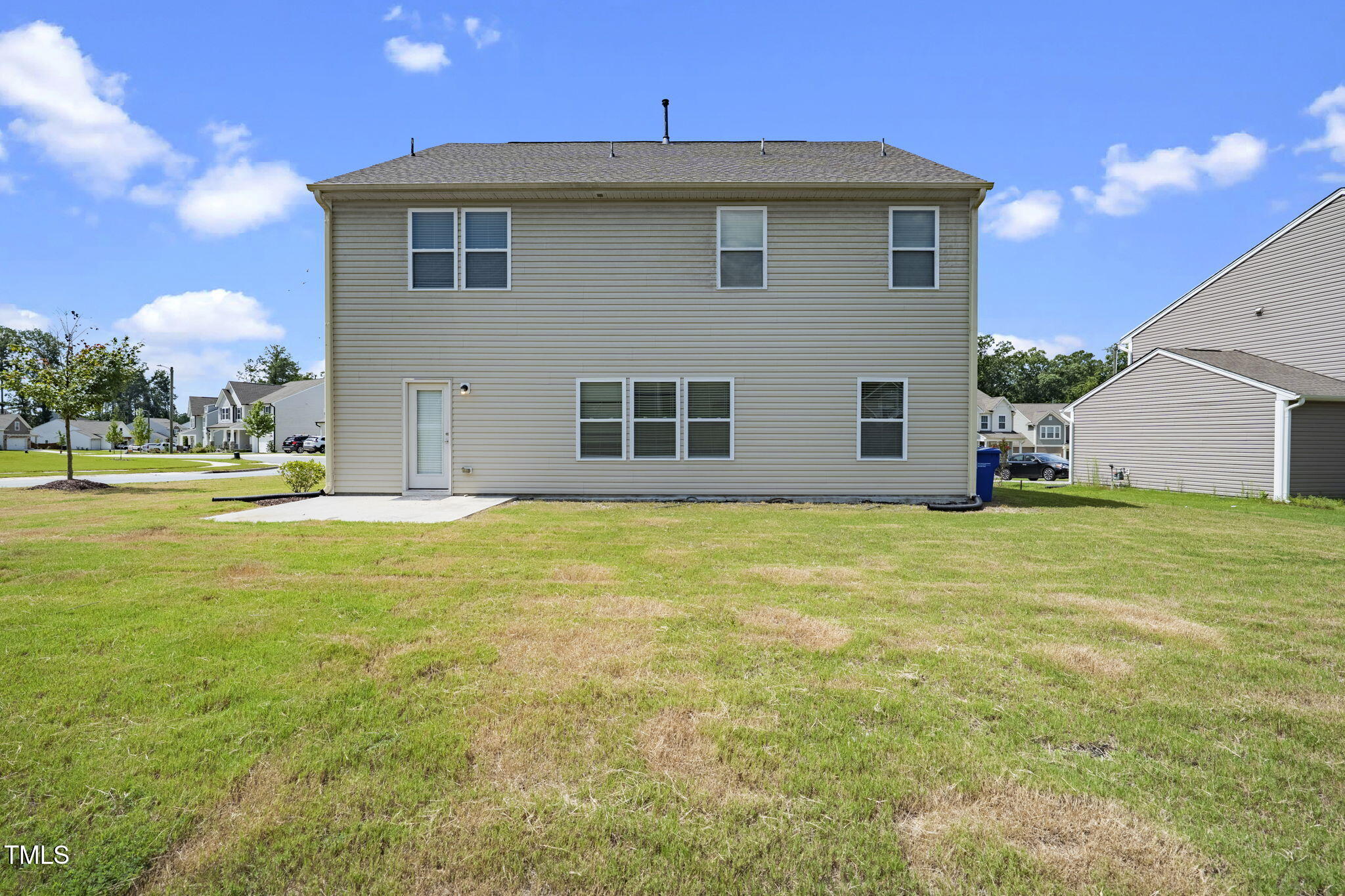 5502 Ripplebrook Drive Durham, NC 27712 - Photo 45 of 50 a view of a house with a backyard