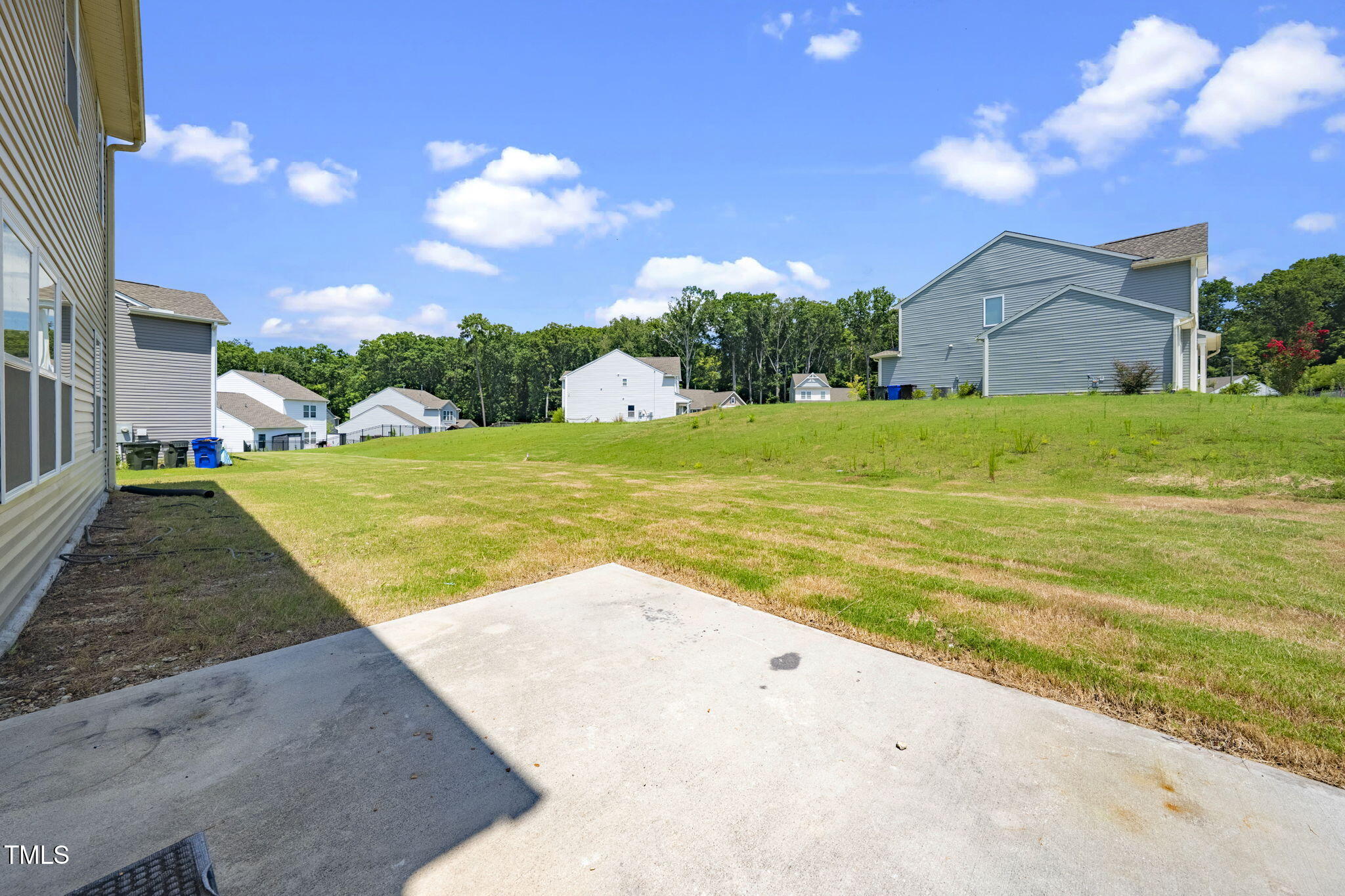 5502 Ripplebrook Drive Durham, NC 27712 - Photo 46 of 50 a view of an house with a backyard space