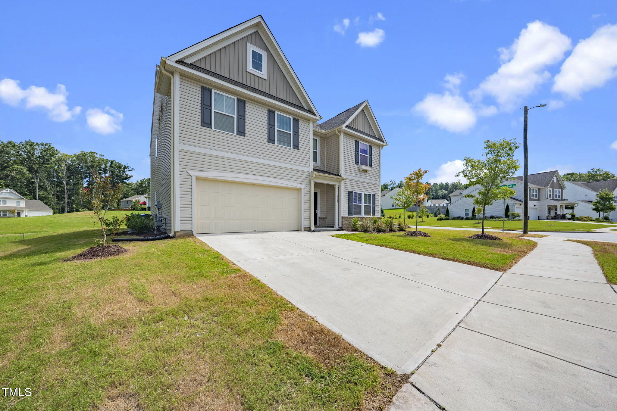5502 Ripplebrook Drive Durham, NC 27712 - Photo 5 of 50 a front view of a house with a yard